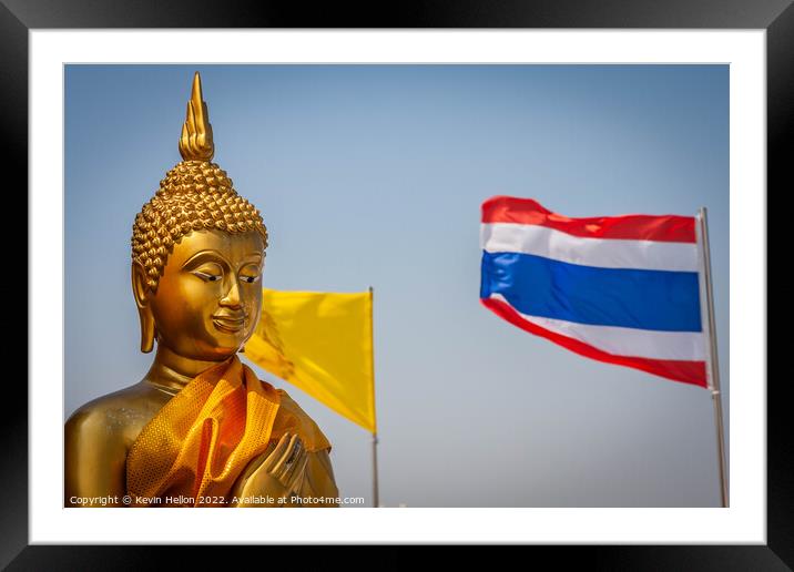 Buddha statue and Thai flag,  Framed Mounted Print by Kevin Hellon