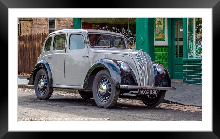A vintage Morris Eight parked on a street Framed Mounted Print by George Robertson