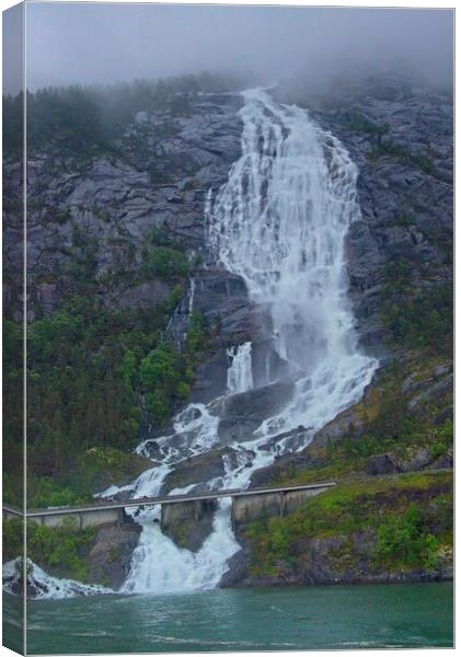 Langfoss Waterfall, Norway Canvas Print by Martyn Arnold