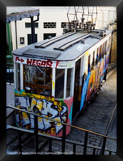 Graffiti on Lisbons Funicular Tram Framed Print by Dudley Wood