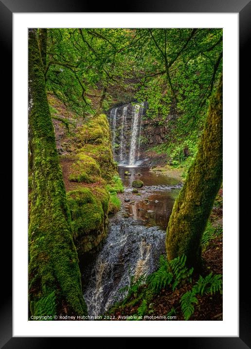 A waterfall in a forest Framed Mounted Print by Rodney Hutchinson