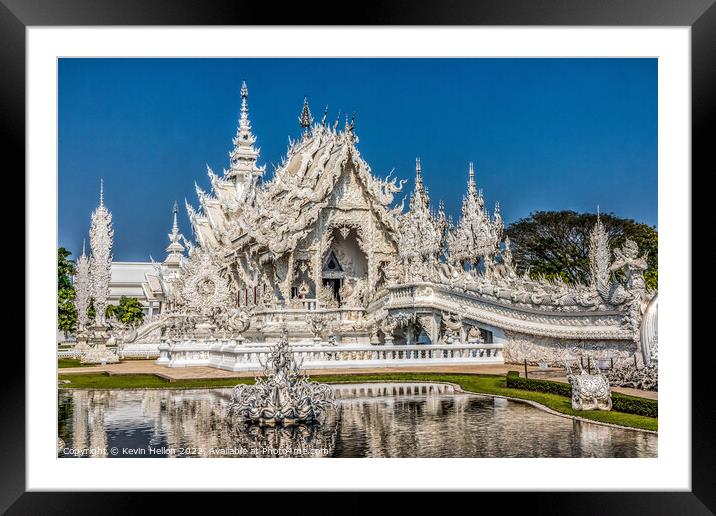 Wat Rong Khun. also known as the White Temple,  Framed Mounted Print by Kevin Hellon