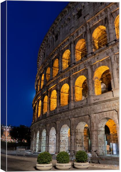 The Colosseum by Night in Rome Canvas Print by Artur Bogacki