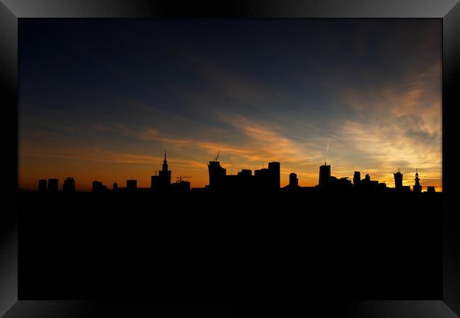 Warsaw Skyline Silhouette At Sunset Framed Print by Artur Bogacki