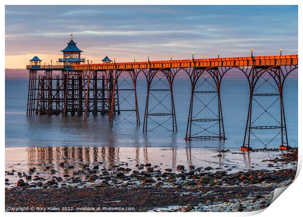 Clevedon Pier at sunset with a low tide Print by Rory Hailes