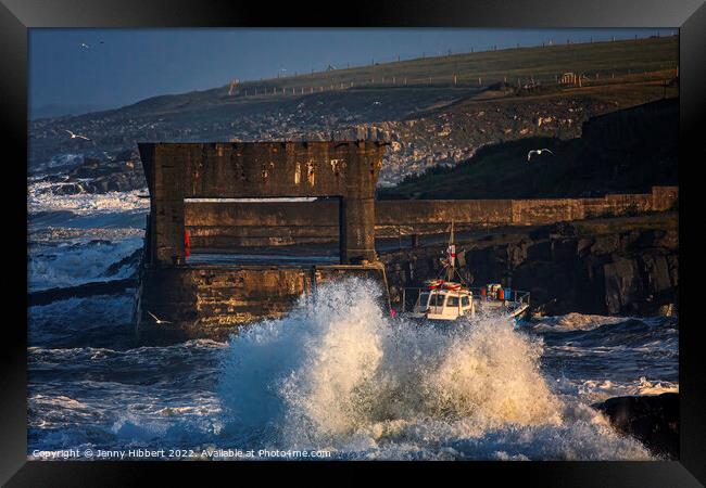 Craster harbour Northumberland, during stormy weather Framed Print by Jenny Hibbert