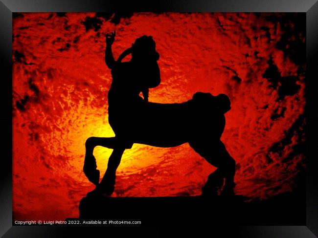 Sculpture of a Centaur against a red hot sky. Framed Print by Luigi Petro