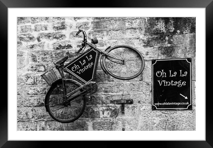 French Elegance: Vintage Bicycle Against Brick Fac Framed Mounted Print by Holly Burgess