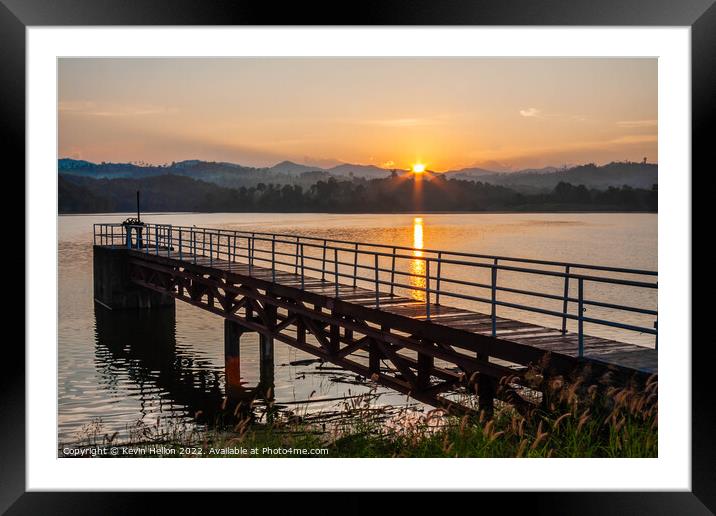 sunrise over the pier Framed Mounted Print by Kevin Hellon
