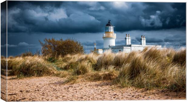 Storm Clouds gather over Chanonry Point Lighthouse Canvas Print by John Frid