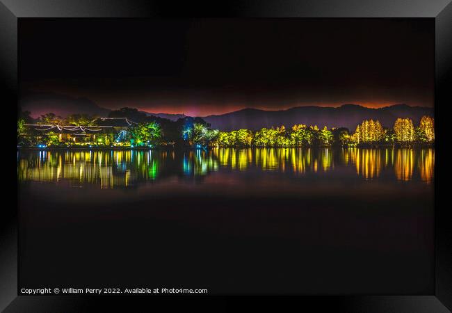 Illuminated  West Lake Reflection Night Lights Hangzhou Zhejiang Framed Print by William Perry