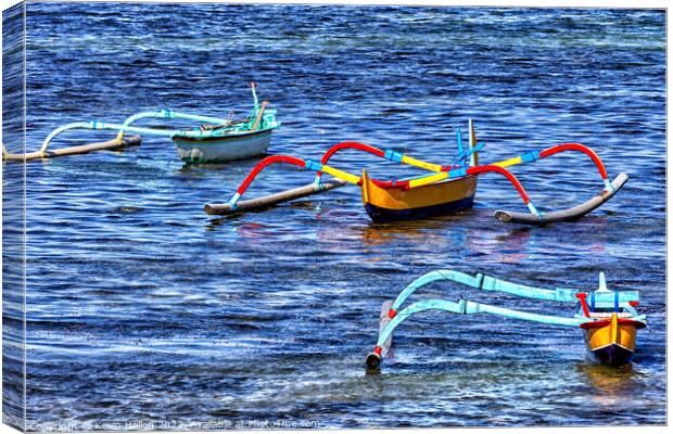 Traditional Balinese fishing boats  Canvas Print by Kevin Hellon