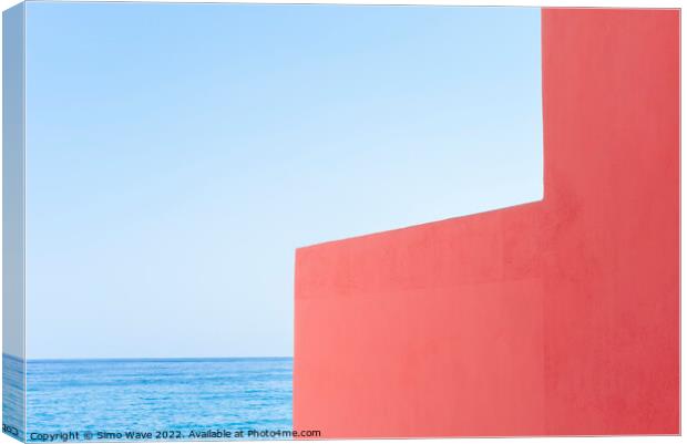 Pink wall against blue sea and sky Canvas Print by Simo Wave
