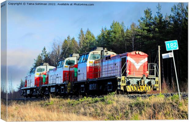 Three Diesel Locomotives At Speed Canvas Print by Taina Sohlman