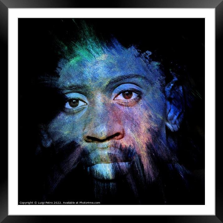 Young black man hidden in the dark. Framed Mounted Print by Luigi Petro