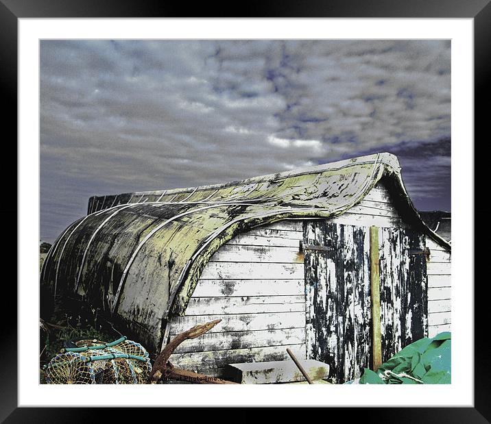 Lindisfarne boat shed Framed Mounted Print by Colin Chipp