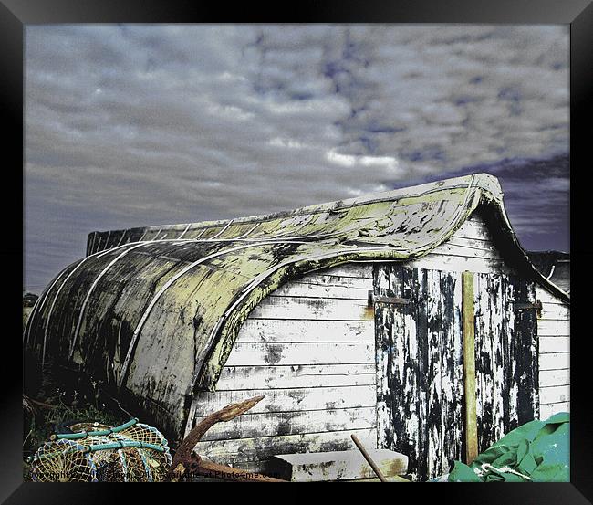 Lindisfarne boat shed Framed Print by Colin Chipp