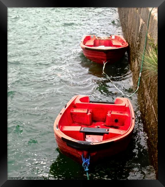 Red Rowboats Framed Print by Stephanie Moore