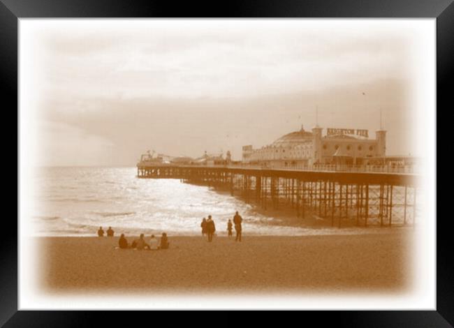 View of Brighton Pier from the beach. Brighton, UK. Framed Print by Luigi Petro