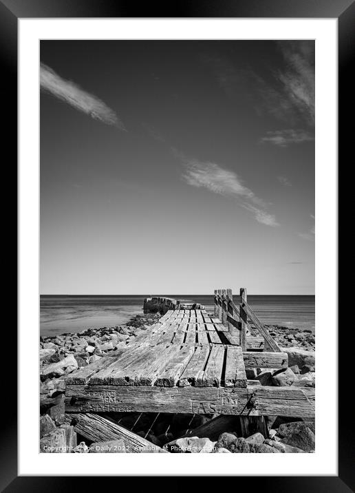 Old breakwater at Lossiemouth beach in Mono Framed Mounted Print by Joe Dailly