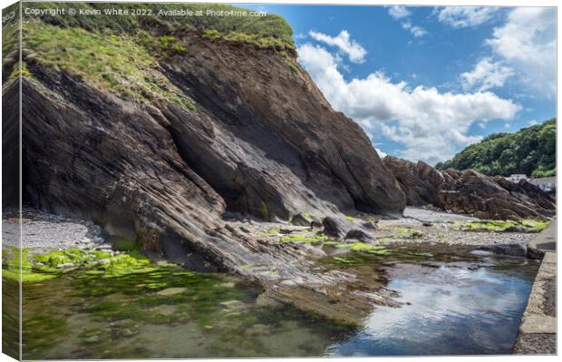 Exotic rock pools at Coombe Martin Canvas Print by Kevin White