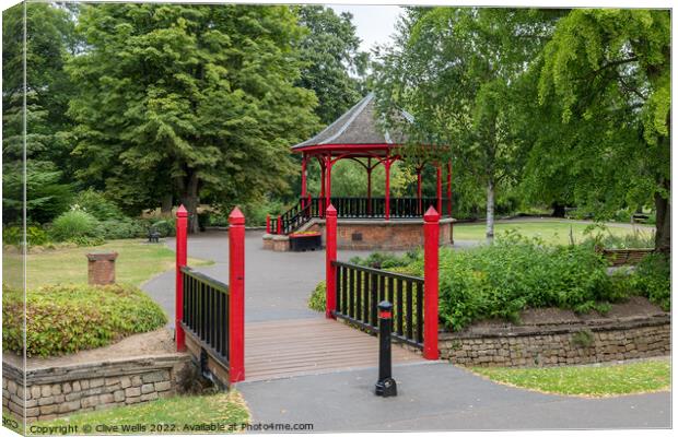 Footbridge to the Band stand Canvas Print by Clive Wells