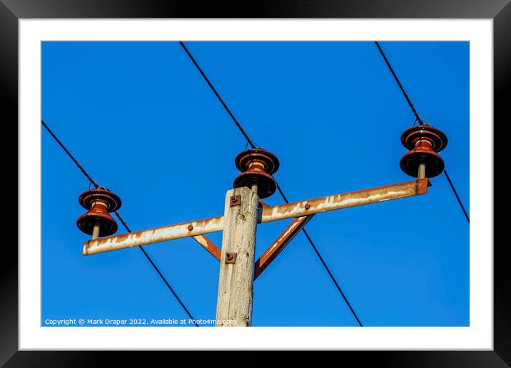 Rusty old  power lines Framed Mounted Print by Mark Draper