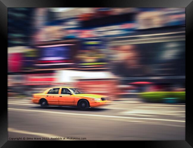 Taxi cab motion in NYC Framed Print by Simo Wave
