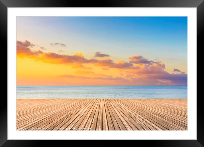 Sunset on the beach Framed Mounted Print by Stan Lihai