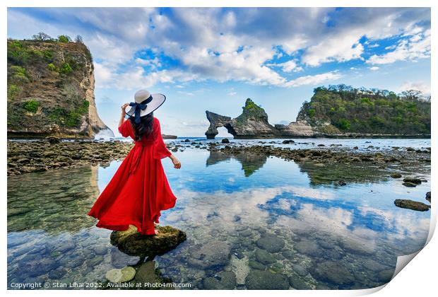 Woman standing on the rock at Atuh beach, Nusa penida island Print by Stan Lihai