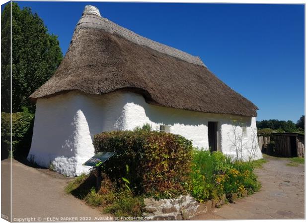 Historical thatched cottage at St Fagans Canvas Print by HELEN PARKER