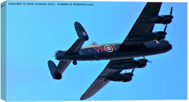 Majestic Lancaster Soars over Southport Canvas Print by Mark Chesters