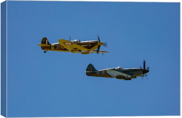 Twin Spitfires Canvas Print by Roger Green