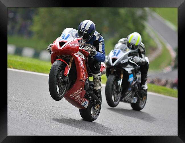 Triumph Triple Challenge 2010 at Cadwell Park Framed Print by SEAN RAMSELL