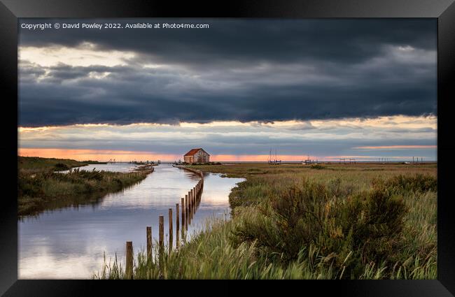 Sunset Reflections in Flooded Thornham Harbour Framed Print by David Powley