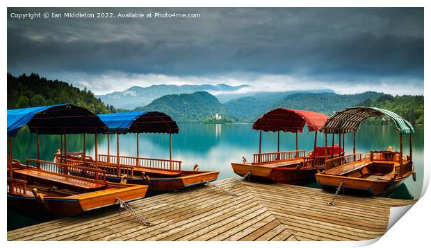 Pletna Boats at Lake Bled Print by Ian Middleton