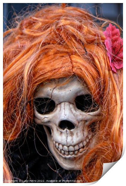 Skull wearing an orange wig. Print by Luigi Petro