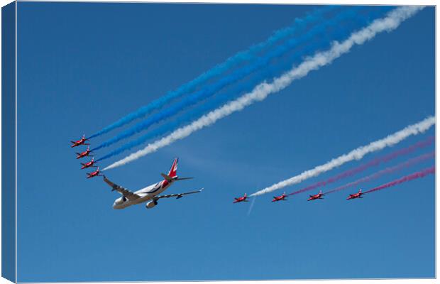 The Red Arrows and Voyager Canvas Print by J Biggadike