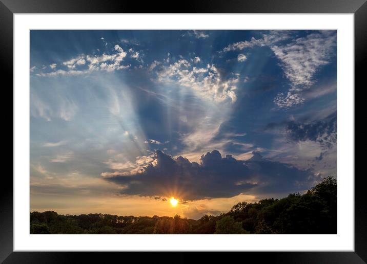 Sun rays and clouds Framed Mounted Print by Leighton Collins