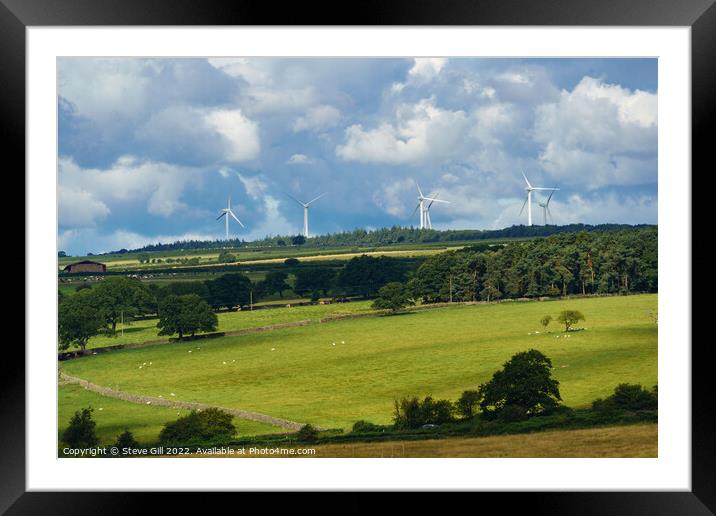Wind Turbines on the Skyline of a Rural Landscape. Framed Mounted Print by Steve Gill