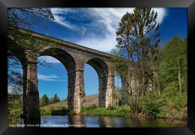 Defunct Arched Railway Line Crossing Over a River. Framed Print by Steve Gill