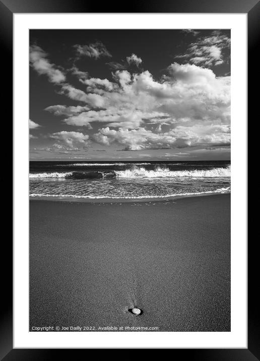 Lone pebble on a monochrome beach Framed Mounted Print by Joe Dailly