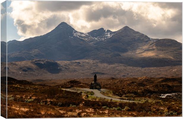 The Black Cuillin Mountain Range with Collie-Mackenzie monument in the foreground Canvas Print by Dan Webster