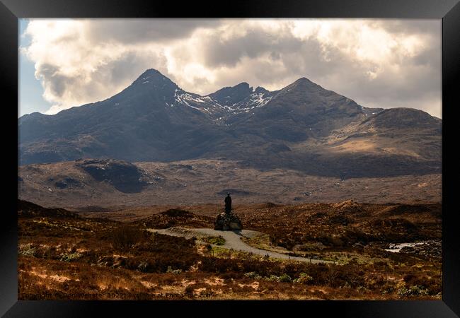 The Black Cuillin Mountain Range with Collie-Mackenzie monument in the foreground Framed Print by Dan Webster