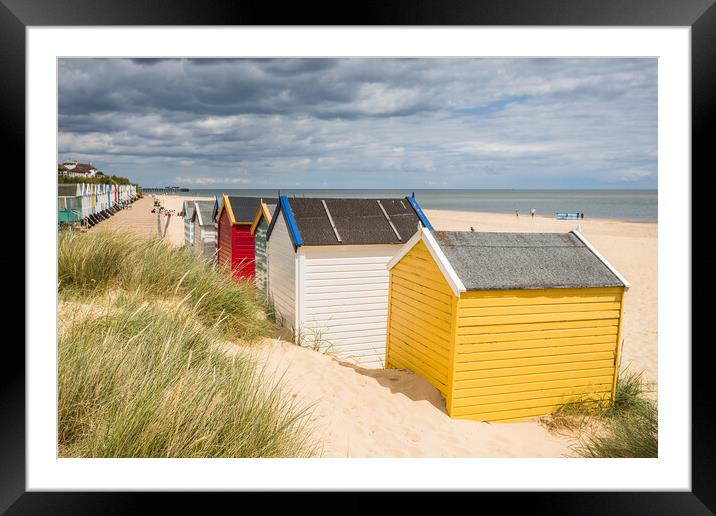 Colourful beach huts at Southwold Framed Mounted Print by Jason Wells