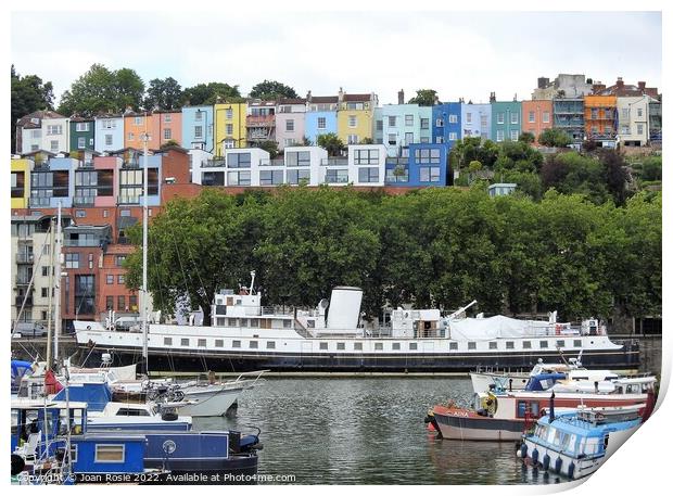 MV Balmoral moored below rows of coloured houses in the floating harbour, Bristol Print by Joan Rosie