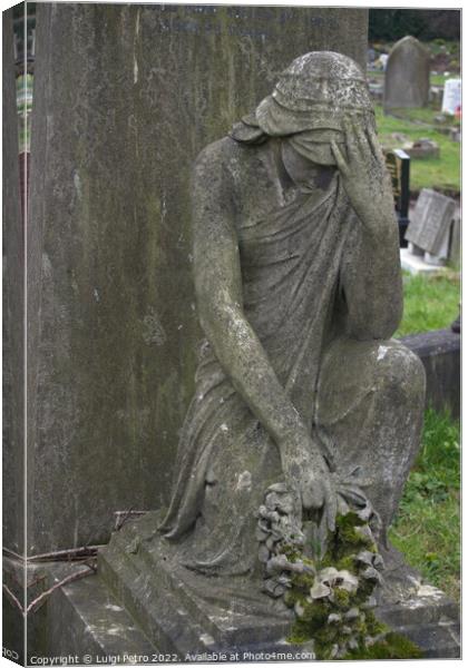 Statue of grieving  woman on a grave. Canvas Print by Luigi Petro