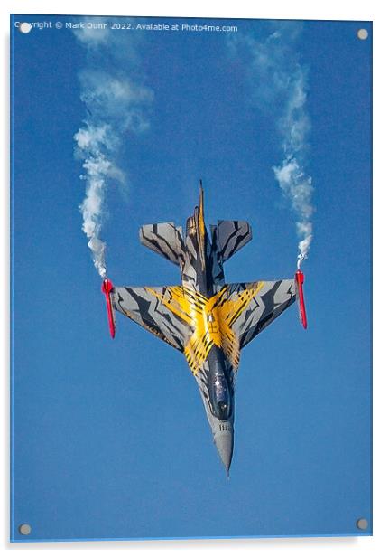 A F16 airplane that is flying in the air with smoke coming out of it Acrylic by Mark Dunn