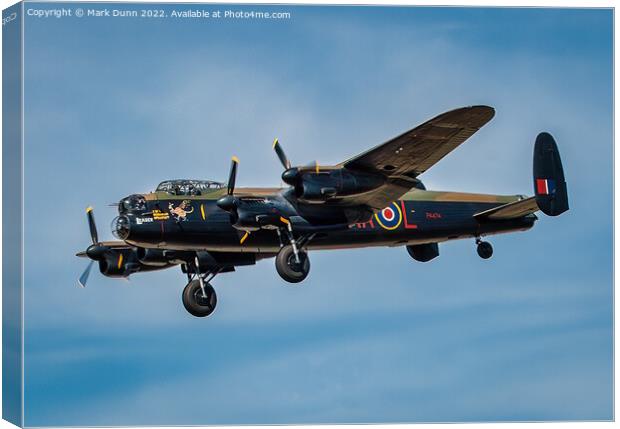 RAF Lancaster Aircraft in flight with wheels down Canvas Print by Mark Dunn