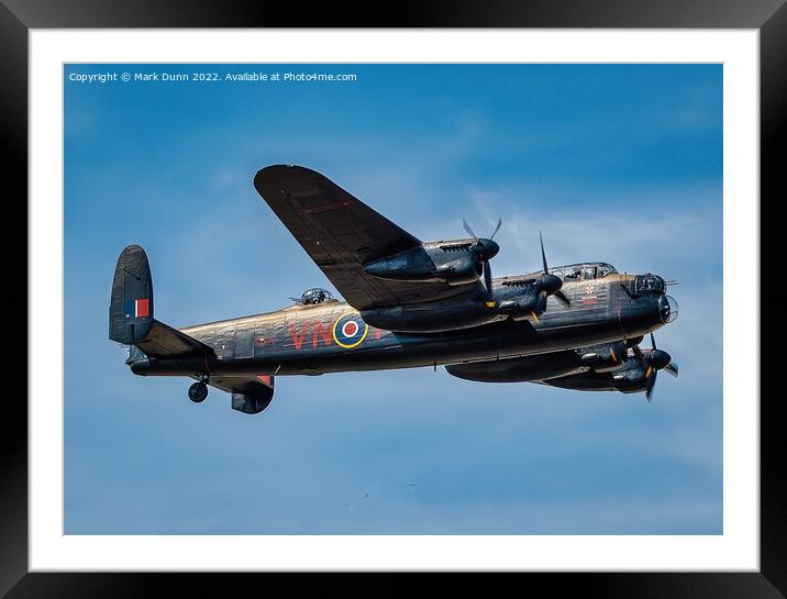 RAF Lancaster Aircraft in flight Framed Mounted Print by Mark Dunn